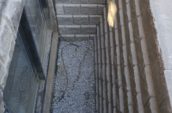 a retaining wall around a basement window